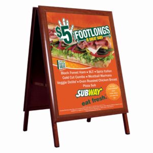 Double-sided wooden A-board poster stand with rich wood finish.